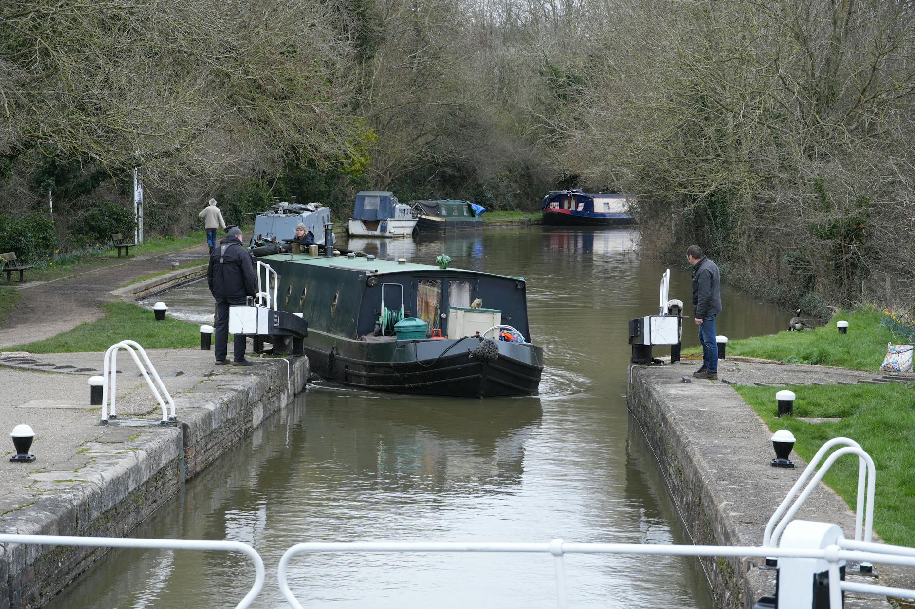 Scenic view of a barge passing through a lock on a canal in Rickmansworth, England.
